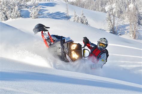 travelers snowmobile west yellowstone